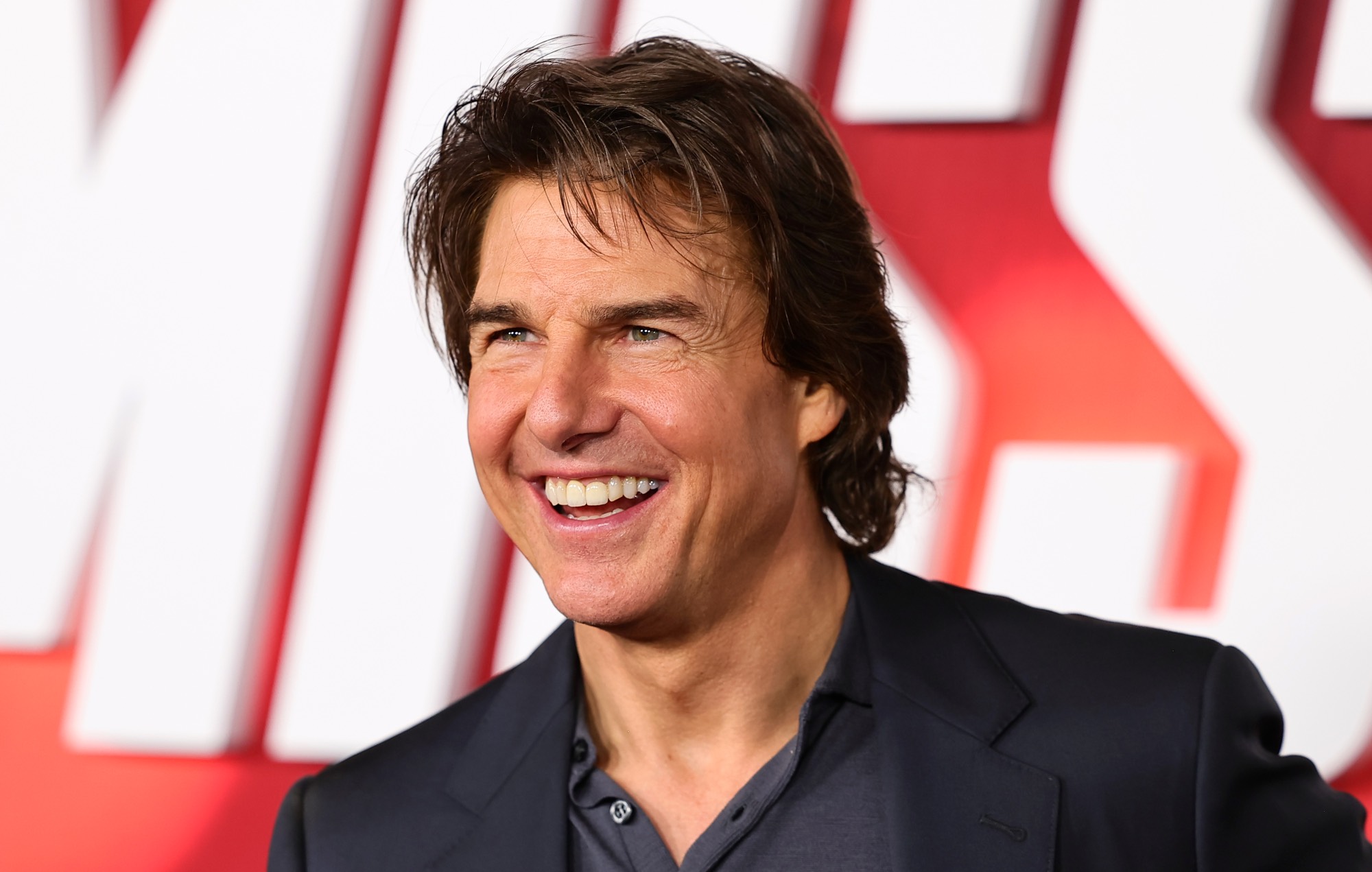 Tom Cruise causes chaos at friend Glen Powell’s ‘Twisters’ London premiere