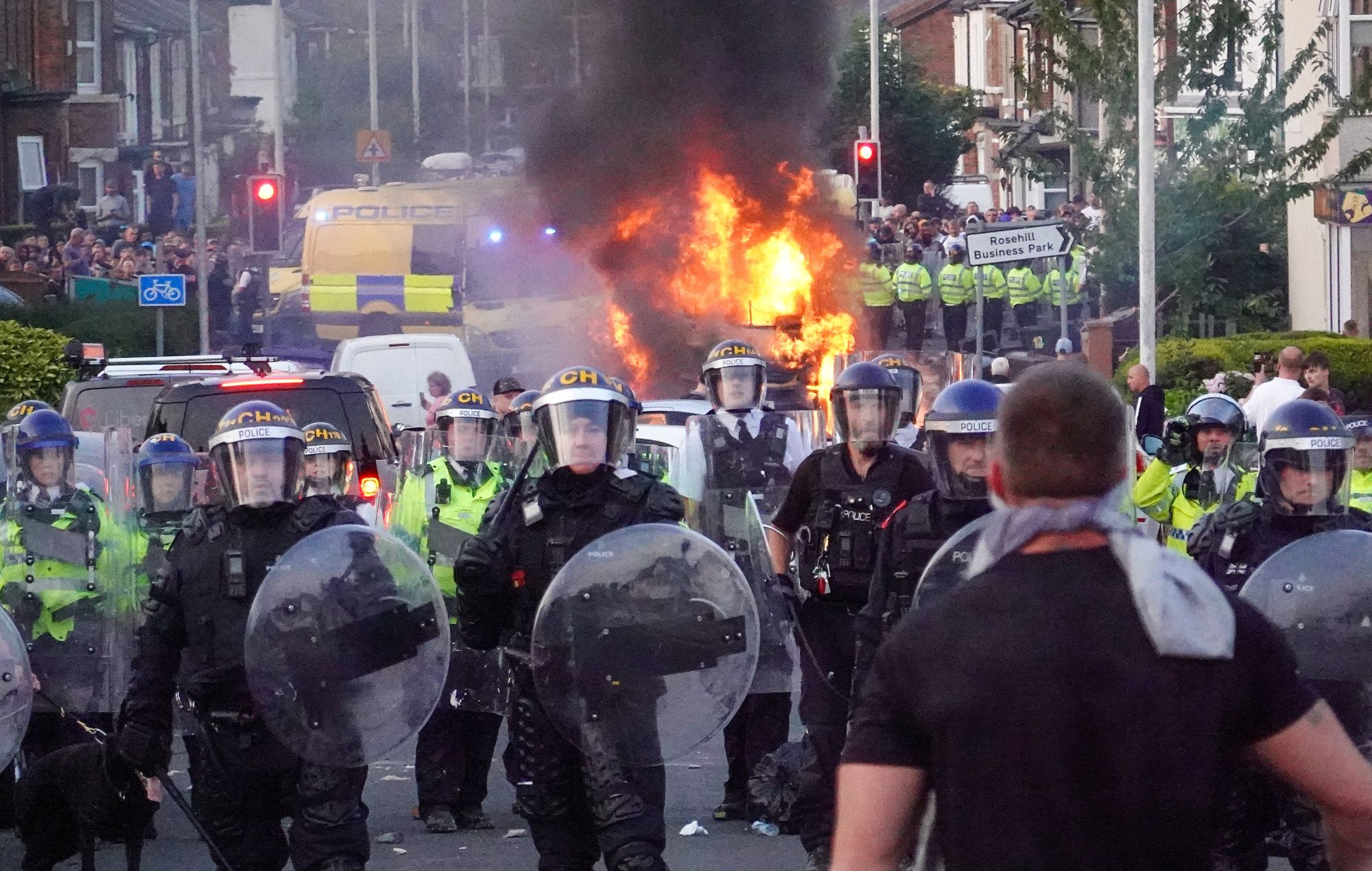 Far-right protestors descend on Southport after knife attack, one goes viral for taking rock to testicles 