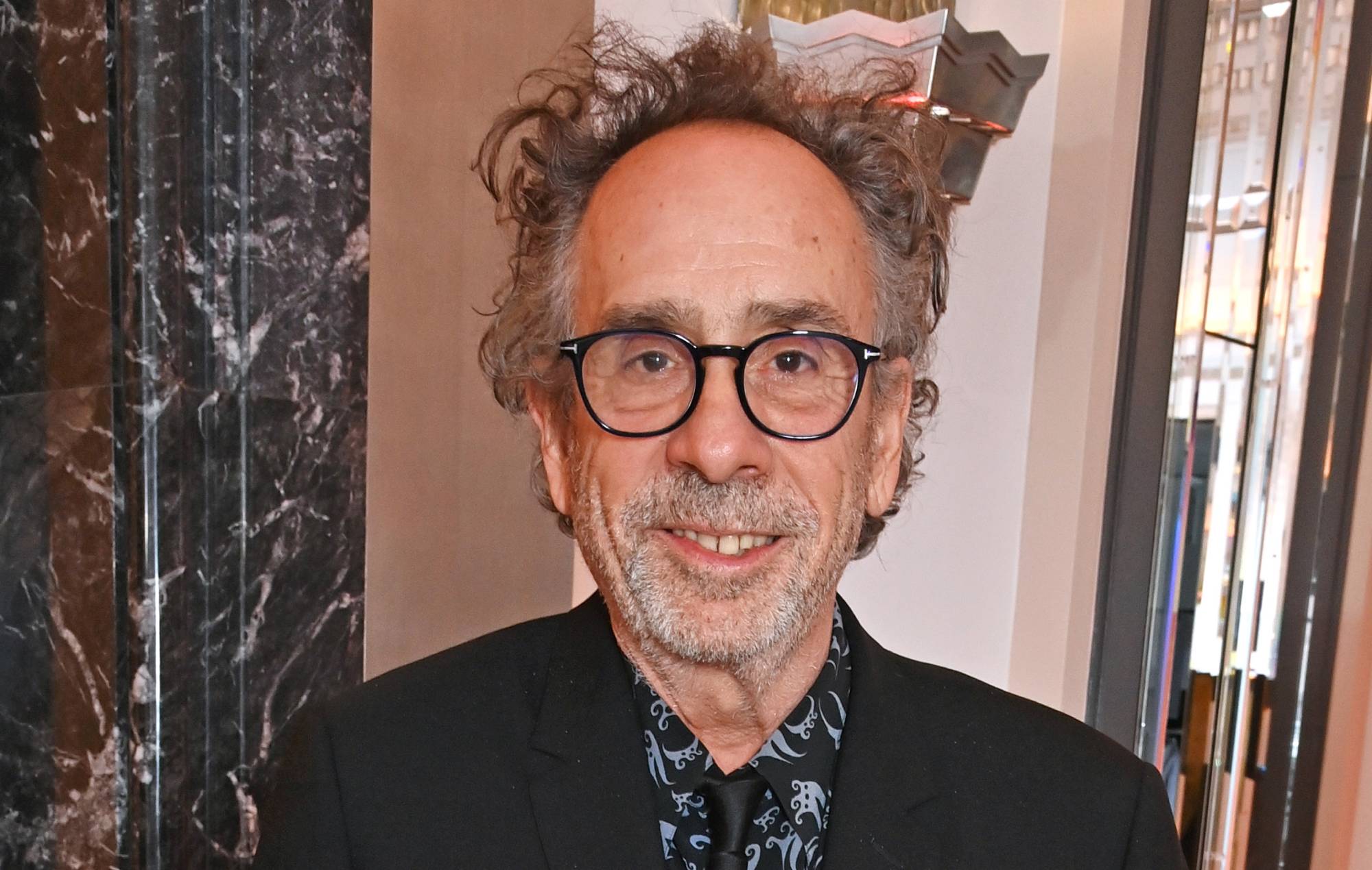 Tim Burton says “Wednesday’ reignited his career and stopped him from retiring